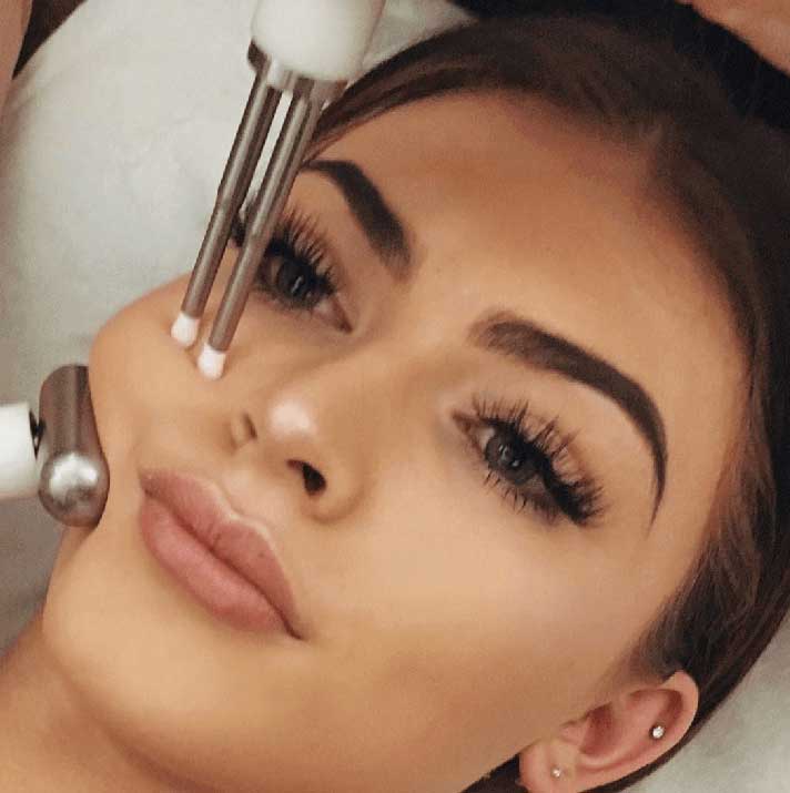 Woman having a CACI Facial