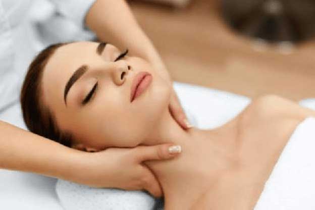 Photo of a lady having an Indian head massage